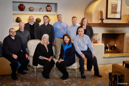 Dr. Joy Colucci (second from the right in the front row) with the Metis leadership team.