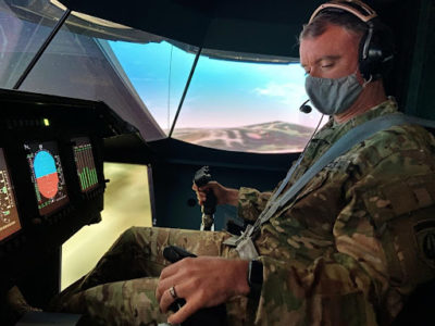 A pilot operates the Vertical Motion Simulator during an ARCTIC test Credits: U.S. Army